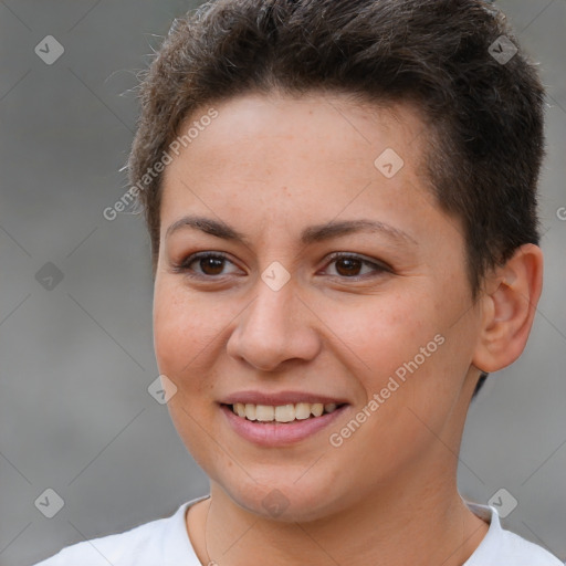 Joyful white young-adult female with short  brown hair and brown eyes