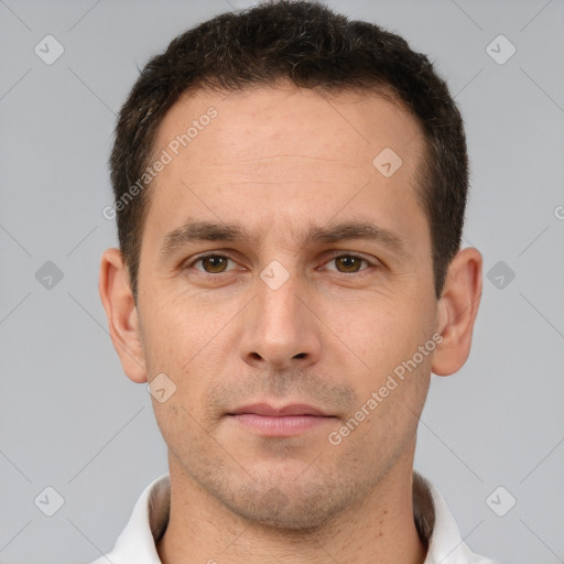 Neutral white adult male with short  brown hair and brown eyes