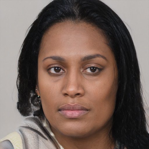 Neutral latino young-adult female with long  black hair and brown eyes