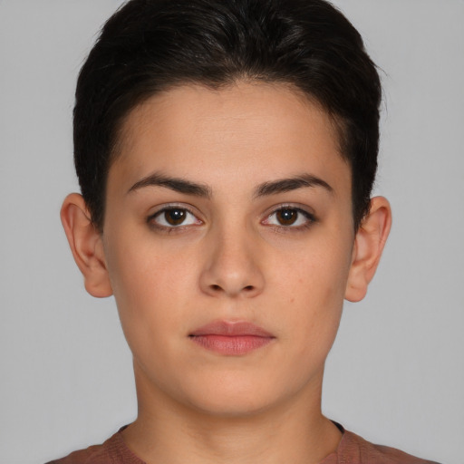 Neutral white young-adult female with short  brown hair and brown eyes