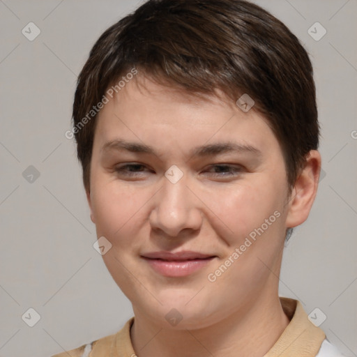 Joyful white young-adult female with short  brown hair and brown eyes