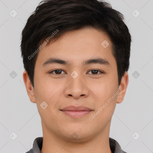 Joyful asian young-adult male with short  brown hair and brown eyes