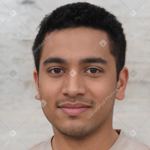 Joyful latino young-adult male with short  black hair and brown eyes