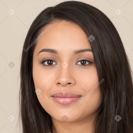 Joyful latino young-adult female with long  black hair and brown eyes