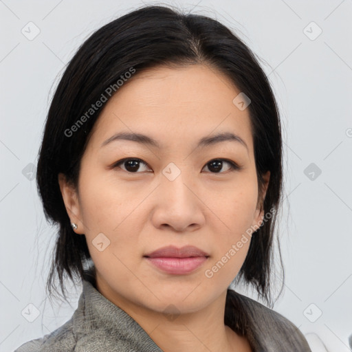 Joyful asian young-adult female with medium  black hair and brown eyes