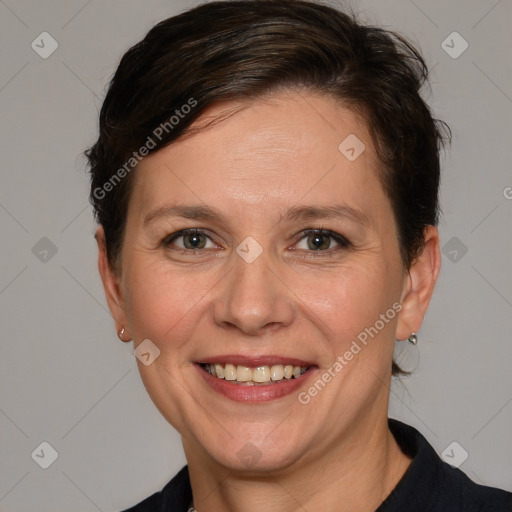 Joyful white adult female with short  brown hair and brown eyes