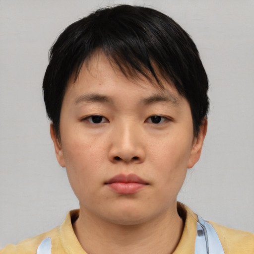Neutral asian young-adult female with short  brown hair and brown eyes