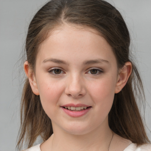 Joyful white child female with medium  brown hair and grey eyes