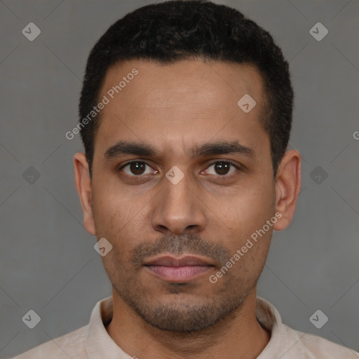 Neutral latino young-adult male with short  black hair and brown eyes