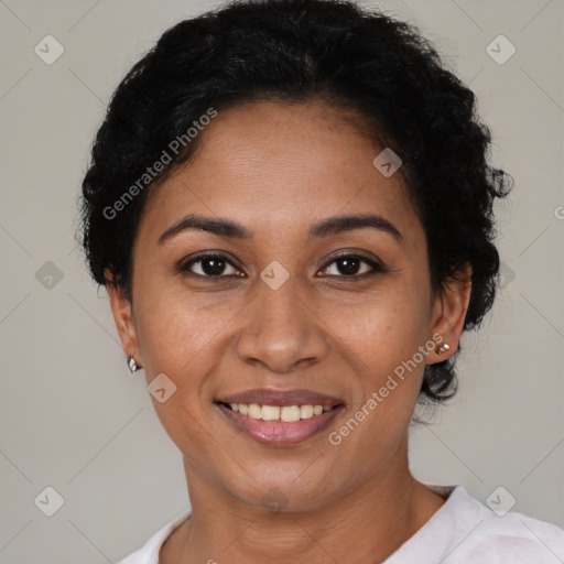 Joyful latino young-adult female with short  brown hair and brown eyes