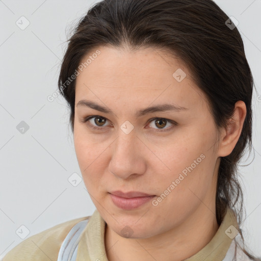 Joyful white young-adult female with medium  brown hair and brown eyes