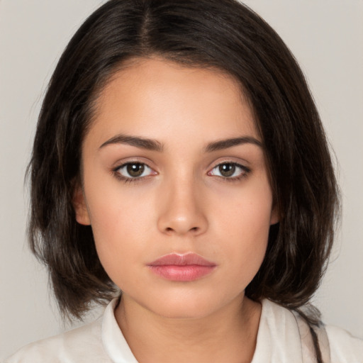 Neutral white young-adult female with medium  brown hair and brown eyes