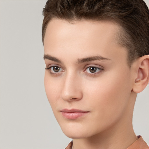 Neutral white young-adult female with short  brown hair and brown eyes