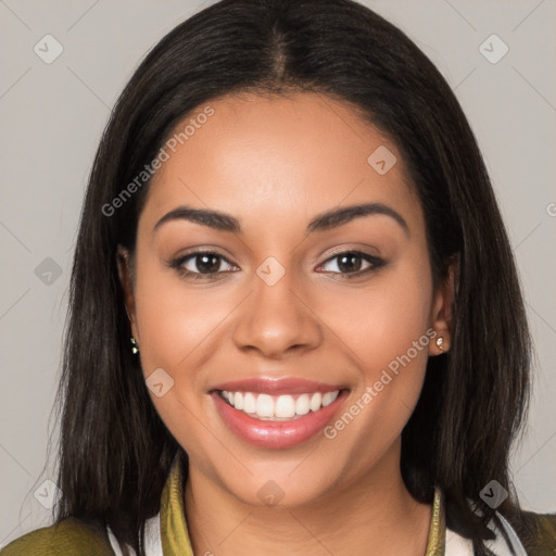 Joyful latino young-adult female with medium  brown hair and brown eyes