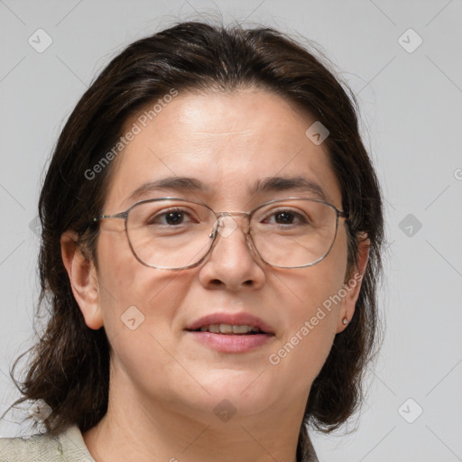 Joyful white adult female with medium  brown hair and brown eyes