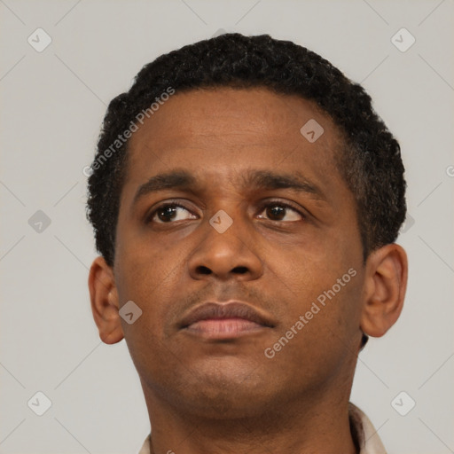 Neutral black young-adult male with short  brown hair and brown eyes