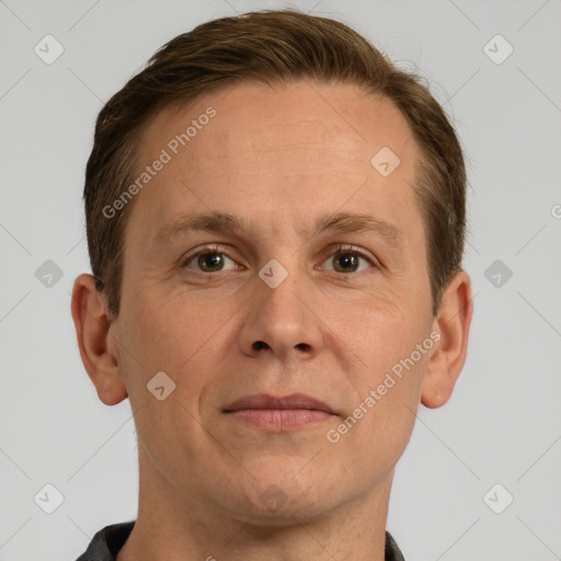 Joyful white adult male with short  brown hair and grey eyes