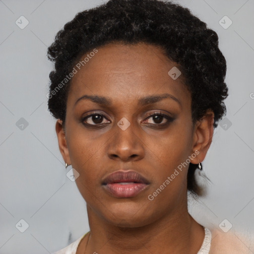 Neutral black young-adult female with short  black hair and brown eyes