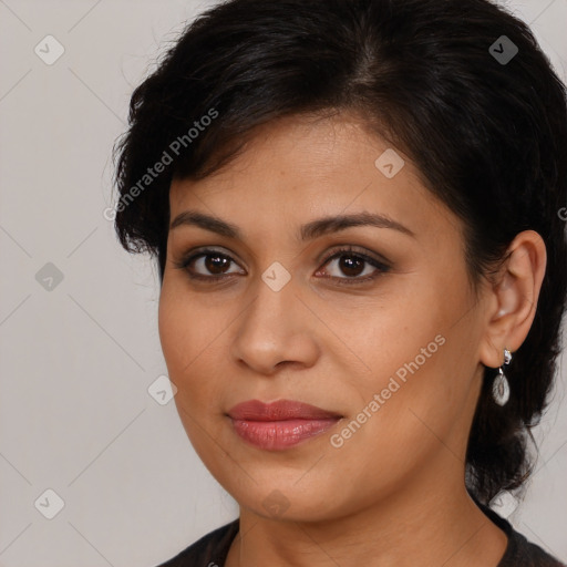 Joyful latino young-adult female with medium  brown hair and brown eyes