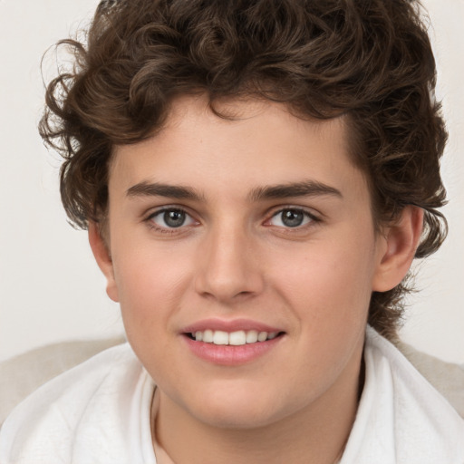 Joyful white young-adult male with medium  brown hair and brown eyes