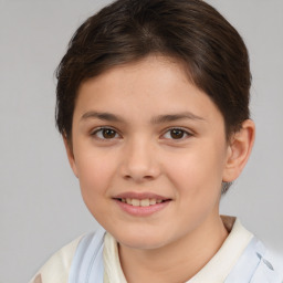 Joyful white child female with short  brown hair and brown eyes