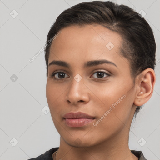 Joyful white young-adult female with short  brown hair and brown eyes