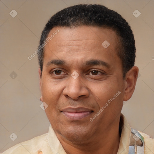 Joyful latino adult male with short  black hair and brown eyes