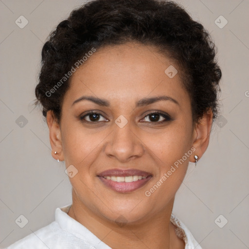 Joyful latino young-adult female with short  brown hair and brown eyes