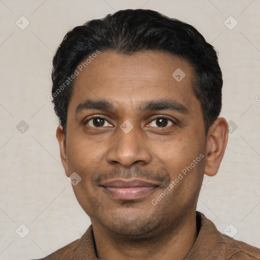 Joyful latino young-adult male with short  black hair and brown eyes