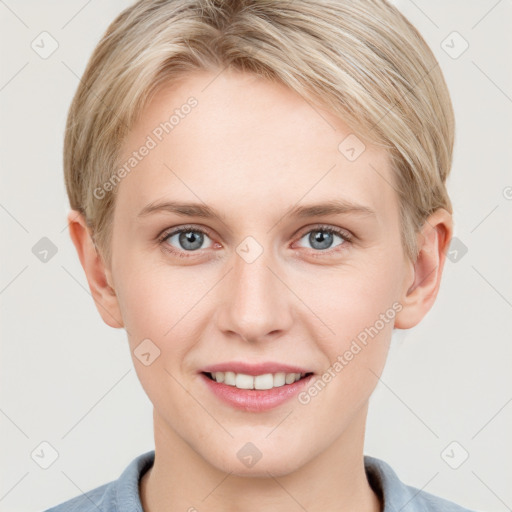 Joyful white young-adult female with short  brown hair and grey eyes