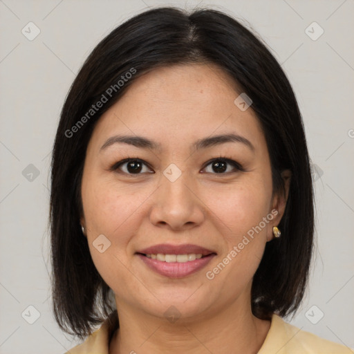 Joyful latino young-adult female with medium  brown hair and brown eyes