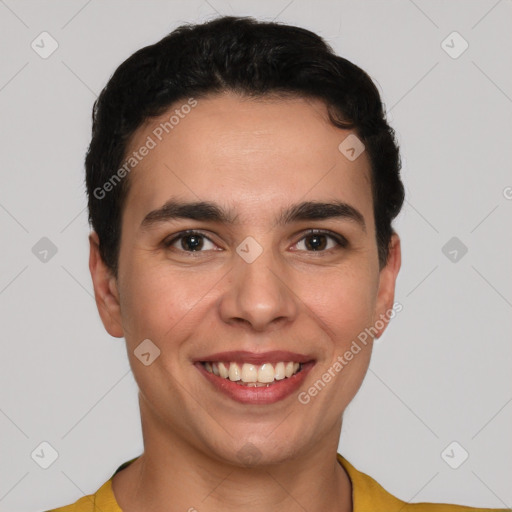 Joyful white young-adult male with short  black hair and brown eyes