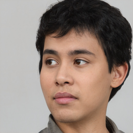 Neutral asian young-adult male with short  black hair and brown eyes