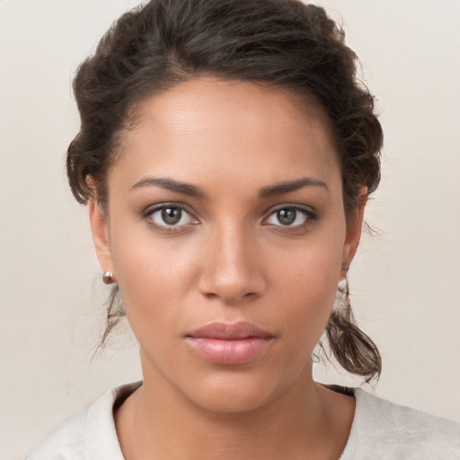 Neutral white young-adult female with short  brown hair and brown eyes