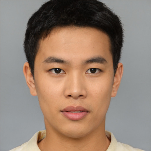 Neutral asian young-adult male with short  brown hair and brown eyes