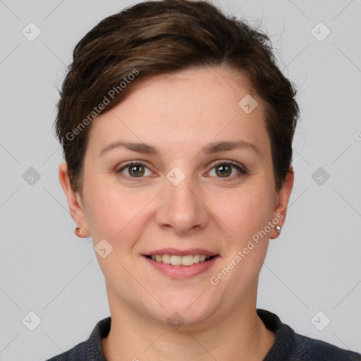 Joyful white young-adult female with short  brown hair and grey eyes