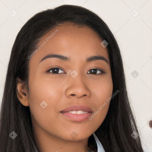 Joyful latino young-adult female with long  brown hair and brown eyes