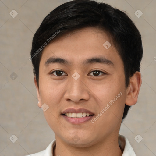 Joyful asian young-adult male with short  brown hair and brown eyes