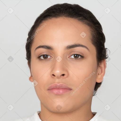 Neutral latino young-adult female with short  black hair and brown eyes