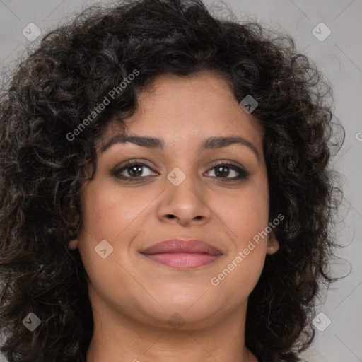 Joyful latino young-adult female with long  brown hair and brown eyes