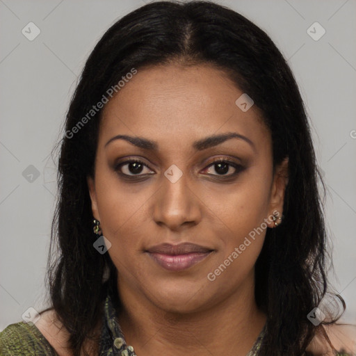 Joyful black young-adult female with long  black hair and brown eyes