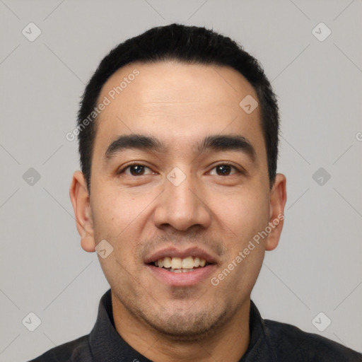 Joyful white young-adult male with short  black hair and brown eyes