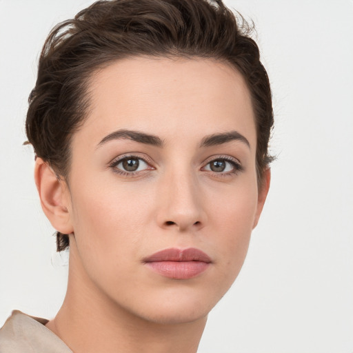 Neutral white young-adult female with short  brown hair and brown eyes