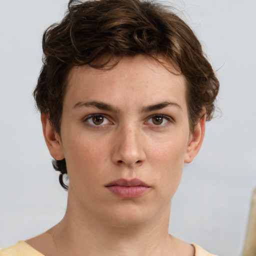 Neutral white young-adult female with short  brown hair and brown eyes