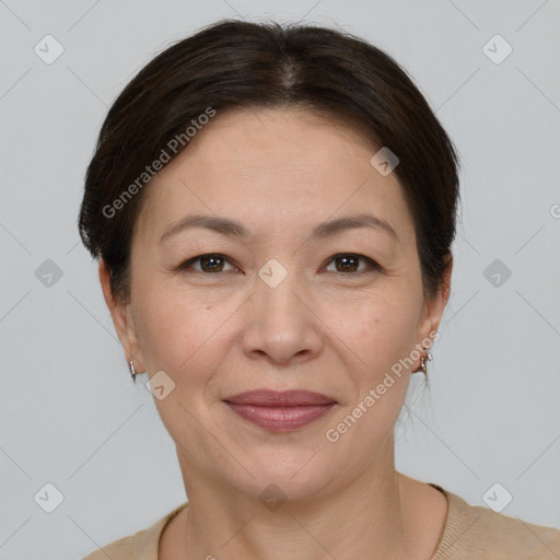 Joyful white adult female with short  brown hair and brown eyes