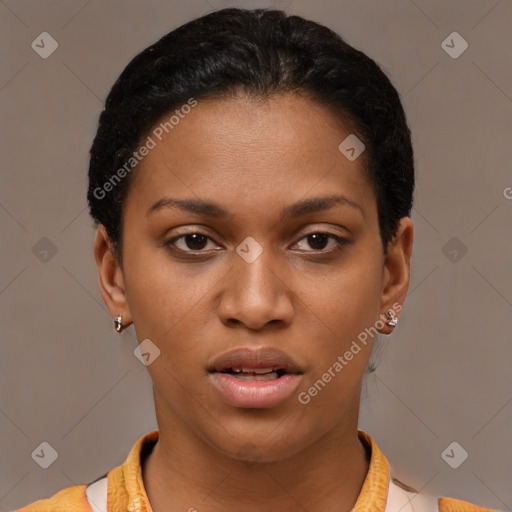 Joyful latino young-adult female with short  brown hair and brown eyes