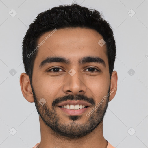 Joyful latino young-adult male with short  black hair and brown eyes