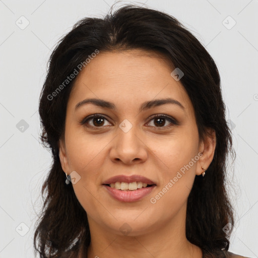 Joyful latino young-adult female with long  brown hair and brown eyes