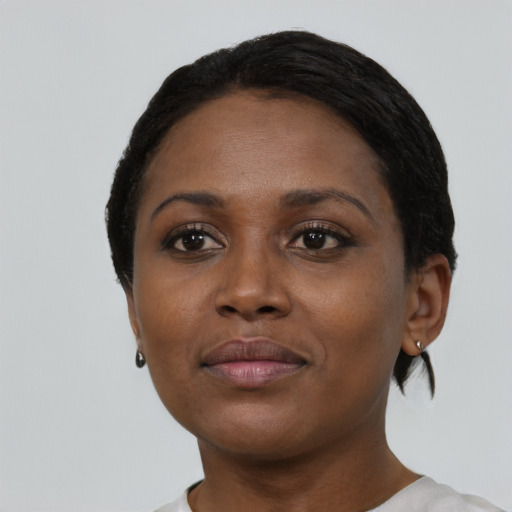 Neutral black young-adult female with short  brown hair and brown eyes
