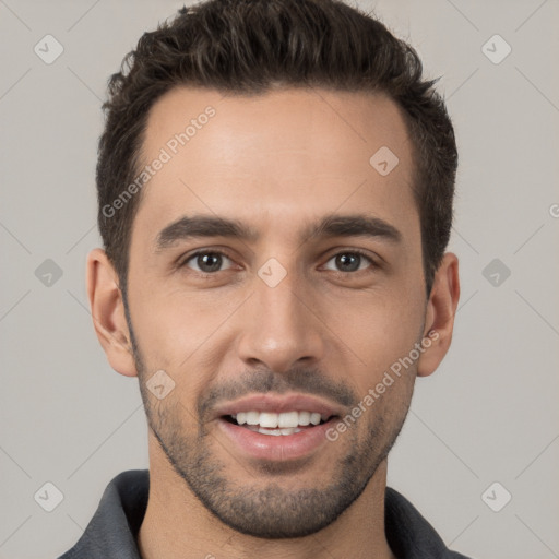 Joyful white young-adult male with short  brown hair and brown eyes